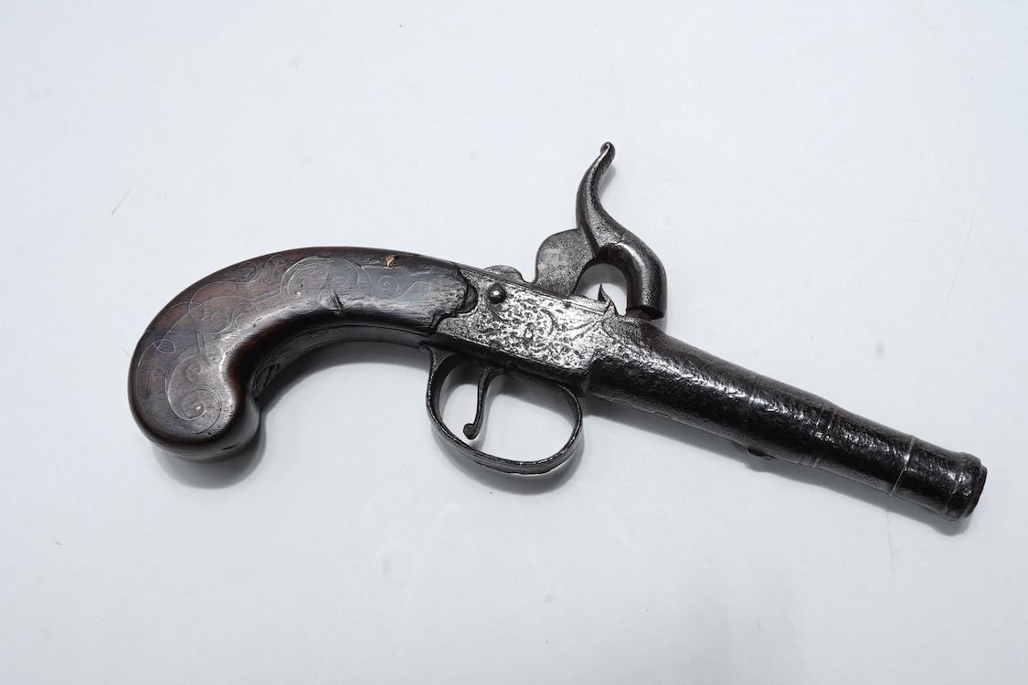 A boxlock percussion travelling pistol, with turn off cannon barrel, 5cm, and London proof marks, frame engraved; TG, with slab walnut grip with silver wire inlay